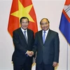 Thủ tướng Nguyễn Xuân Phúc và Thủ tướng Vương quốc Campuchia Samdech Techo Hun Sen sang dự Lễ Quốc tang nguyên Chủ tịch nước Lê Đức Anh. (Ảnh: Thống Nhất/TTXVN)