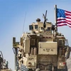 Binh sỹ Mỹ làm nhiệm vụ tại thị trấn Ras al-Ain, tỉnh Hasakeh, Syria. (Ảnh: AFP/TTXVN)