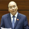 Thủ tướng Nguyễn Xuân Phúc trả lời chất vấn của đại biểu Quốc hội. (Ảnh: Thống Nhất/TTXVN)