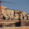 Công trình xây dựng khu định cư Do Thái Ramat Shlomo ở Jerusalem. (Ảnh: AFP/TTXVN)