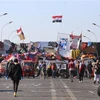 Người biểu tình tập trung tại Baghdad, Iraq. (Ảnh: AFP/TTXVN)