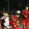 Pha bóng quyết liệt giữa hai đội trong trận U22 Việt Nam thắng U22 Indonesia với tỷ số 2-1. (Ảnh: TTXVN)