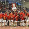 Đội U22 Việt Nam ăn mừng chiếc huy chương Vàng Sea Games lịch sử. (Ảnh: Hoàng Linh/TTXVN)