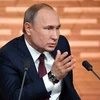 Tổng thống Nga Vladimir Putin phát biểu trong cuộc họp báo thường niên tại Moskva ngày 19/12. (Ảnh: AFP/TTXVN)