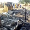 Hiện trường một vụ tấn công do Boko Haram ở Nigeria. (Ảnh: AFP/TTXVN)