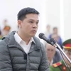 Bị cáo Nguyễn Quang Thành, cựu Giám đốc Công ty trách nhiệm hữu hạn Minh Hưng Phát, khai báo trước Hội đồng xét xử. (Ảnh: Doãn Tấn/TTXVN)
