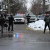 Cảnh sát điều tra tại hiện trường vụ xả súng tại Ottawa, Canada. (Ảnh: THX/TTXVN)