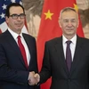 Phó Thủ tướng Trung Quốc Lưu Hạc và Bộ trưởng Tài chính Mỹ Steven Mnuchin tại vòng đàm phán thương mại mới ở Bắc Kinh (Trung Quốc) ngày 29/3/2019. (Ảnh: AFP/TTXVN)