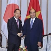 Thủ tướng Nguyễn Xuân Phúc và ông Nikai Toshiro, Tổng thư ký đảng Dân chủ Tự do Nhật Bản đang có chuyến thăm và làm việc Việt Nam. (Ảnh: Thống Nhất/TTXVN)