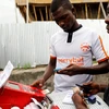 Dịch vụ tài chính được số hóa giúp tạo ra nhiều cơ hội hơn cho giới trẻ. Ảnh minh họa. (Nguồn: theafricareport.com)