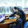 Đo thân nhiệt từ xa và quan sát tình trạng sức khỏe của hành khách nhập cảnh từ Trung Quốc vào Việt Nam. Ảnh minh họa. (Ảnh: Minh Đông/TTXVN)