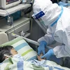 Bệnh nhân nhiễm virus corona được điều trị tại một bệnh viện ở Vũ Hán, Trung Quốc. (Ảnh: AFP/TTXVN)