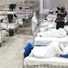 Bệnh nhân nhiễm virus 2019-nCoV được điều trị tại một bệnh viện dã chiến ở Vũ Hán, Trung Quốc. (Ảnh: THX/TTXVN)