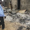 Hiện trường một vụ tấn công tại một ngôi làng ở Sangha, Mali. (Ảnh: AFP/TTXVN)