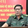 Đại tá Hồ Tú Điền, Chỉ huy trưởng Bộ đội Biên phòng Kiên Giang, báo cáo công tác. (Ảnh: Xuân Khu/TTXVN)