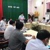Ban chỉ đạo phòng, chống dịch COVID-19 tỉnh Kiên Giang làm việc khẩn cấp với Ủy ban nhân dân huyện Phú Quốc tối 15/3. (Ảnh: TTXVN phát)