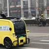 Xe tự hành để gửi đơn đặt hàng tạp hóa của dịch vụ giao hàng trực tuyến Meituan Dianping. (Nguồn: Meituan Dianping)