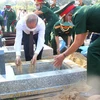 Lễ an táng các Anh hùng liệt sỹ tại Nghĩa trang Liệt sỹ thành phố Huế. (Ảnh: Tường Vi/TTXVN)