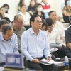 Bị cáo Văn Hữu Chiến, nguyên Chủ tịch thành phố Đà Nẵng và đồng phạm tại phiên tòa. (Ảnh: Doãn Tấn/TTXVN)