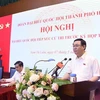 Bí thư Thành ủy Hà Nội Vương Đình Huệ phát biểu tại buổi tiếp xúc cử tri quận Nam Từ Liêm. (Ảnh: Văn Điệp/TTXVN)