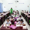 Học sinh Trường Tiểu học Đinh Bộ Lĩnh, thành phố Rạch Giá (Kiên Giang) trong giờ học môn Tiếng Việt. (Ảnh: Hồng Đạt/TTXVN)