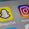 Biểu tượng của Snapchat trên màn hình máy tính bảng. (Ảnh: AFP/TTXVN)