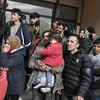 Người tị nạn trên đảo Lesbos, Hy Lạp. (Ảnh: AFP/TTXVN)