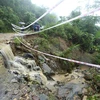Đoạn đường 156 bị ảnh hưởng do mưa lũ gây ra từ ngày 3-5/7 tại xã Trịnh Tường, huyện Bát Xát (tỉnh Lào Cai). (Ảnh: Vũ Sinh/TTXVN)