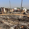 Hiện trường một vụ tấn công tại Maiduguri, bang Borno, đông bắc Nigeria. (Ảnh: AFP/TTXVN)