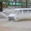 Cảnh ngập lụt sau mưa lớn do ảnh hưởng của bão Hagupit tại tỉnh Chiết Giang, miền Đông Trung Quốc. (Ảnh: THX/TTXVN)