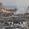 Cảnh tan hoang sau vụ nổ kinh hoàng ở khu cảng thủ đô Beirut, Liban. (Ảnh: AFP/TTXVN)