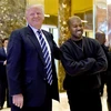 Tổng thống Mỹ Donald Trump (trái) và nghệ sỹ nhạc rap Kanye West trong cuộc gặp tại New York, Mỹ, ngày 13/12/2016. (Ảnh: AFP/TTXVN)