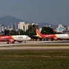 Máy bay của Hãng hàng không Vietjet tại sân bay Đà Nẵng. (Ảnh: Ngọc Hà/TTXVN)