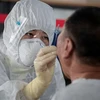 Trung Quốc và Hàn Quốc ghi nhận hàng chục ca nhiễm mới COVID-19