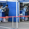 Một điểm lấy mẫu xét nghiệm COVID-19 tại Seoul, Hàn Quốc. (Ảnh: AFP/TTXVN)