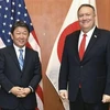 Ngoại trưởng Nhật Bản Toshimitsu Motegi (trái) và người đồng cấp Mỹ Mike Pompeo (phải) tại cuộc gặp ở Munich, Đức ngày 15/2. (Ảnh: Kyodo/TTXVN)