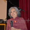 Bà Trần Tố Nga trong một buổi nói chuyện tại Paris về các di chứng của chất độc da cam. (Ảnh: Bích Hà/Vietnam+)