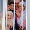 Niềm vui tới lớp của các học sinh tị nạn Syria ở trại Hirjila. (Ảnh: Trần Hiếu/Vietnam+)