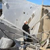 Cảnh đổ nát sau vụ không kích của Israel xuống thành phố Khan Younis, Nam Dải Gaza. (Ảnh: THX/TTXVN)