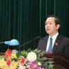 Ông Phạm Quang Ngọc, tân Chủ tịch UBND tỉnh Ninh Bình phát biểu tại kỳ họp. (Ảnh: Đức Phương/TTXVN)