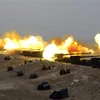 Một cuộc diễn tập pháo binh của quân đội Triều Tiên. (Ảnh: AFP/TTXVN)