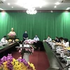 Quang cảnh cuộc họp khẩn của Ban Chỉ đạo phòng, chống dịch bệnh COVID-19 tỉnh Vĩnh Long. (Ảnh: Lê Thúy Hằng/TTXVN)
