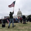 Người biểu tình tập trung gần tòa nhà Quốc hội Mỹ tại Washington, D.C. (Ảnh: THX/TTXVN)
