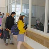 Người dân làm thủ tục xuất nhập cảnh tại Trạm Kiểm soát Biên phòng (Đồn Biên phòng Cửa khẩu Quốc tế Lệ Thanh). (Nguồn: baogialai.com.vn)