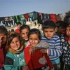 Trẻ em tại một trại tị nạn ở Kafr Lusin, tỉnh Idlib, Tây Bắc Syria. (Ảnh: AFP/TTXVN)