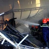 Lực lượng Cảnh sát Phòng cháy chữa cháy và cứu hộ cứu nạn, Công an tỉnh Thái Bình đã có mặt kịp thời để khống chế đám cháy. (Ảnh: Thế Duyệt/TTXVN)