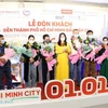Lễ đón khách đến Thành phố Hồ Chí Minh đầu năm 2021. (Ảnh: Mỹ Phương/TTXVN)