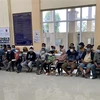 Những người nhập cảnh trái phép từ Campuchia về An Giang tại Trạm Biên phòng Cửa khẩu quốc tế Tịnh Biên, An Giang. (Ảnh: TTXVN phát)