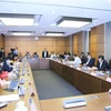Đoàn đại biểu Quốc hội các tỉnh An Giang, Bắc Kạn, Hà Tĩnh và Lào Cai thảo luận ở tổ. (Ảnh: Doãn Tấn/TTXVN)