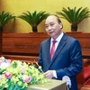 Thủ tướng Nguyễn Xuân Phúc giới thiệu, quán triệt chuyên đề: Chiến lược phát triển kinh tế-xã hội 10 năm 2021-2030 và phương hướng, nhiệm vụ phát triển kinh tế-xã hội 5 năm 2021-2025. (Ảnh: Thống Nhất/TTXVN)